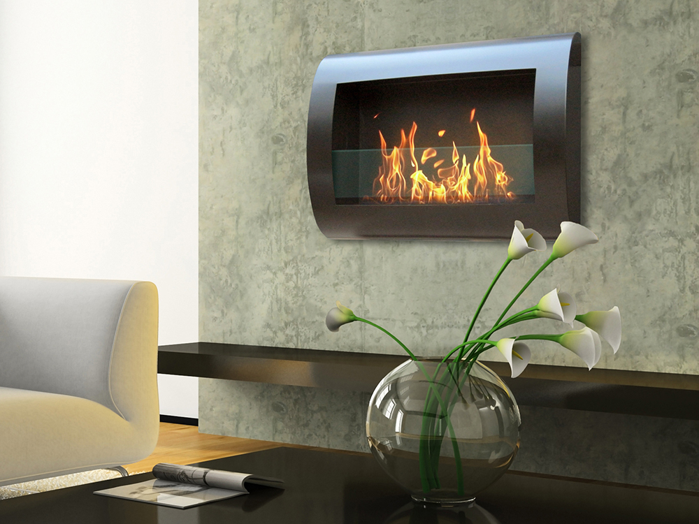 A roaring fire bellows from this wall-mounted ventless fireplace by Anywhere Fireplace